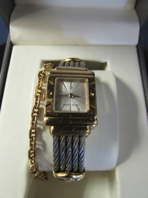 PHILIPPE CHARRIOL WOMENS WATCH AND WALLET: GOLD AND SILVER TONE WATCH