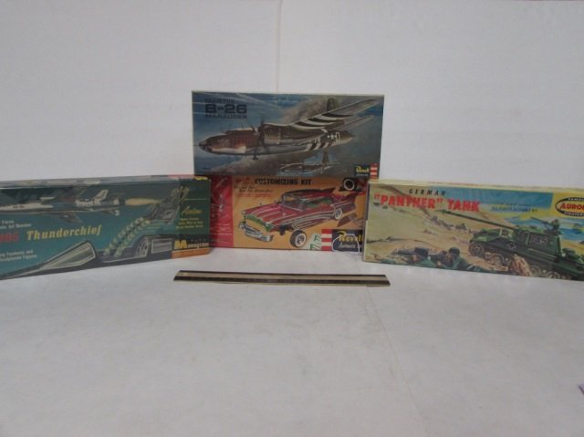4 VINTAGE PLASTIC MODEL KITS: 4 VINTAGE PLASTIC MODEL KITS SOME ARE MISSING PARTS, INSTRUCTION MANUALS, & DECALS, BUICK CENTURY, GERMAN PANTHER TANK, F-105 THUNDERCHIEF, & MARTIN B-26 MARAUNDER