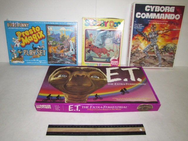 4 VINTAGE BOARD GAMES: 4 VINTAGE BOARD GAMES SCOOBY DOO JIGSAW PUZZLE, BUGS BUNNY PRESTO MAGIX PLAYSET, CYBORG COMMANDO GAME, & THE E.T. GAME