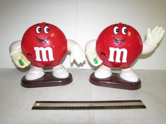 PLASTIC M&M CANDY DISPENSERS (2): PLASTIC M&M CANDY DISPENSERS (2) BOTH ARE THE RED M&M, ONE SHOWS SOME WEAR