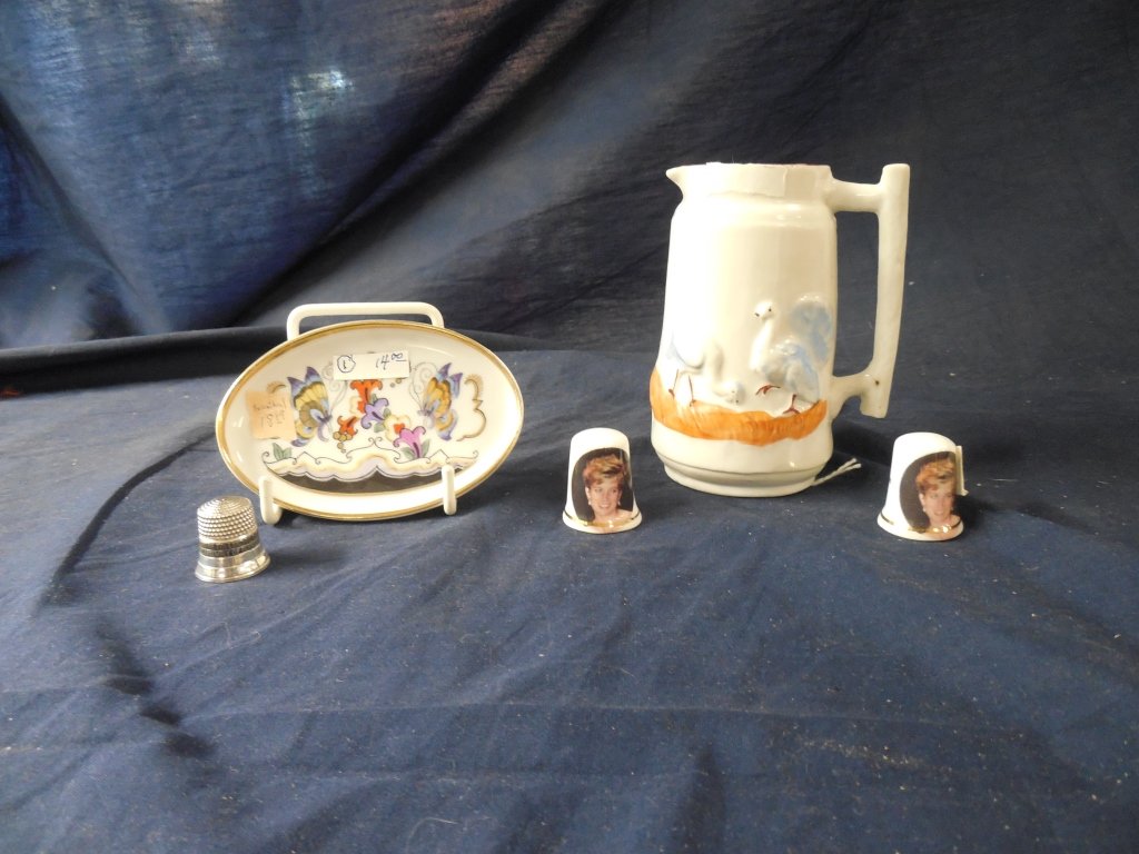 ROSENTHAL PIECES & THIMBLES (5): ROSENTHAL PIECES & THIMBLES (5) INCLUDES TWO CERAMIC THIMBLES WITH IMAGES OF PRINCESS DIANA'S FACE, METAL THIMBLE, SMALL HAND-PAINTED ROSENTHAL DECORATIVE PLATE WITH BUTTERFLY MOTIF, CERAMIC CREAMER W