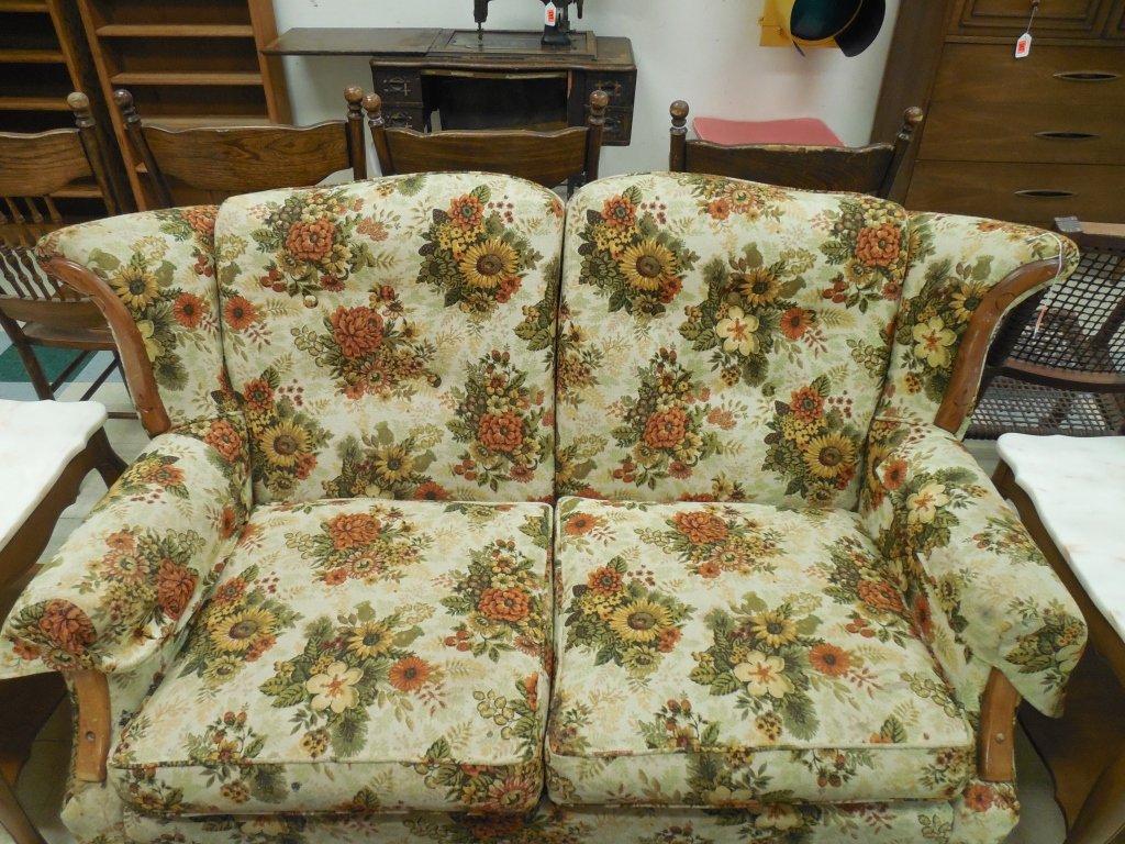 FLORAL LOVESEAT WITH CARVED WOOD FRAME: FLORAL LOVESEAT WITH CARVED WOOD FRAME 56" LONG BY 35" TALL BY 34" DEEP