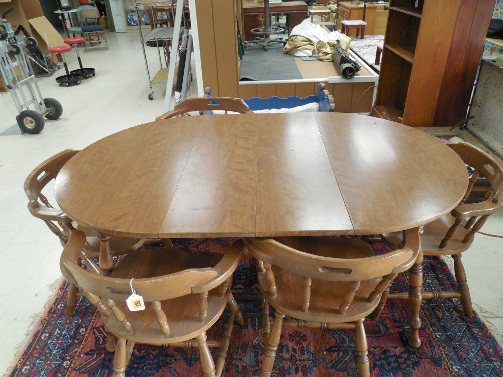 WOOD DINING ROOM TABLE AND CHAIRS SET: WOOD DINING ROOM TABLE AND CHAIRS SET INCLUDES 6 CHAIRS WITH 2 LEAVES, 65" LONG BY 42" WIDE BY 29.5" TALL, CHAIRS ARE 28" TALL BY 19" WIDE BY 16.5" DEEP