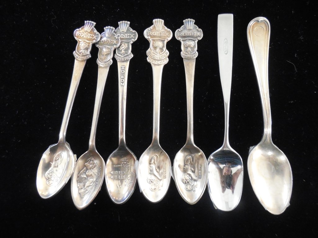 BUCHERER OF SWITZERLAND SOUVENIR SPOONS (6): BUCHERER OF SWITZERLAND SOUVENIR SPOONS (6) ROLEX BUCHERER WATCHES SPOONS MARKED B 100 12 AND CB 6,9 M DEMITASSE SPOONS PLUS TWO OTHER SPOONS BY REED & BARTON AND ' ELITA'