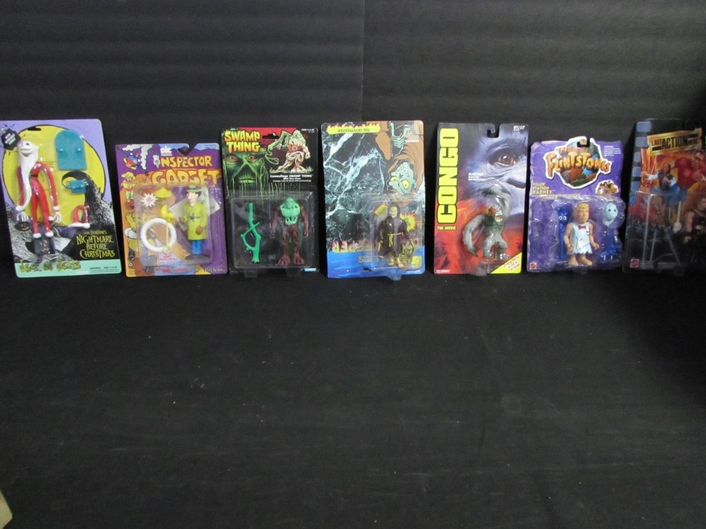 ASSORTED COLLECTIBLE ACTION FIGURES (7): ALL ARE IN ORIGINAL PACKAGING, CONGO, THE CRYPTKEEPER, THE FLINSTONES, INSPECTOR GADGET, NIGHTMARE BEFORE CHRISTMAS, & LAST ACTION HERO