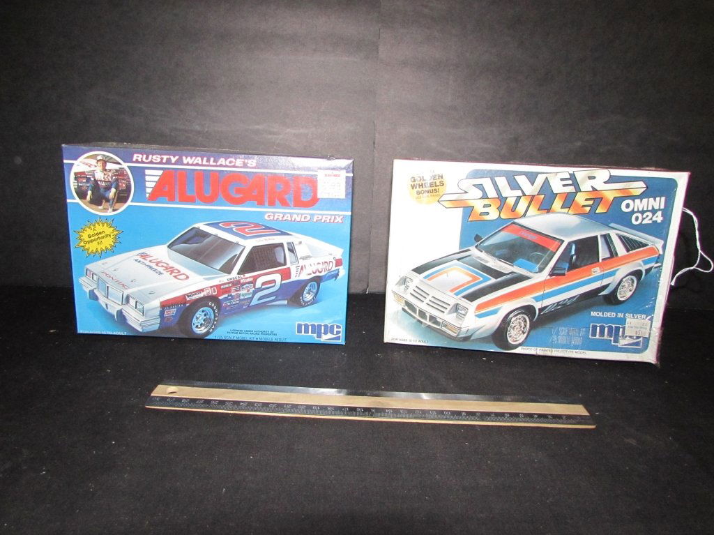 2 PLASTIC CAR MODEL KITS: SILVER BULLET OMNI 024 & RUSTY WALLACES GRAND PRIX, BOTH ARE 9IN ORIGINAL PACKAGING