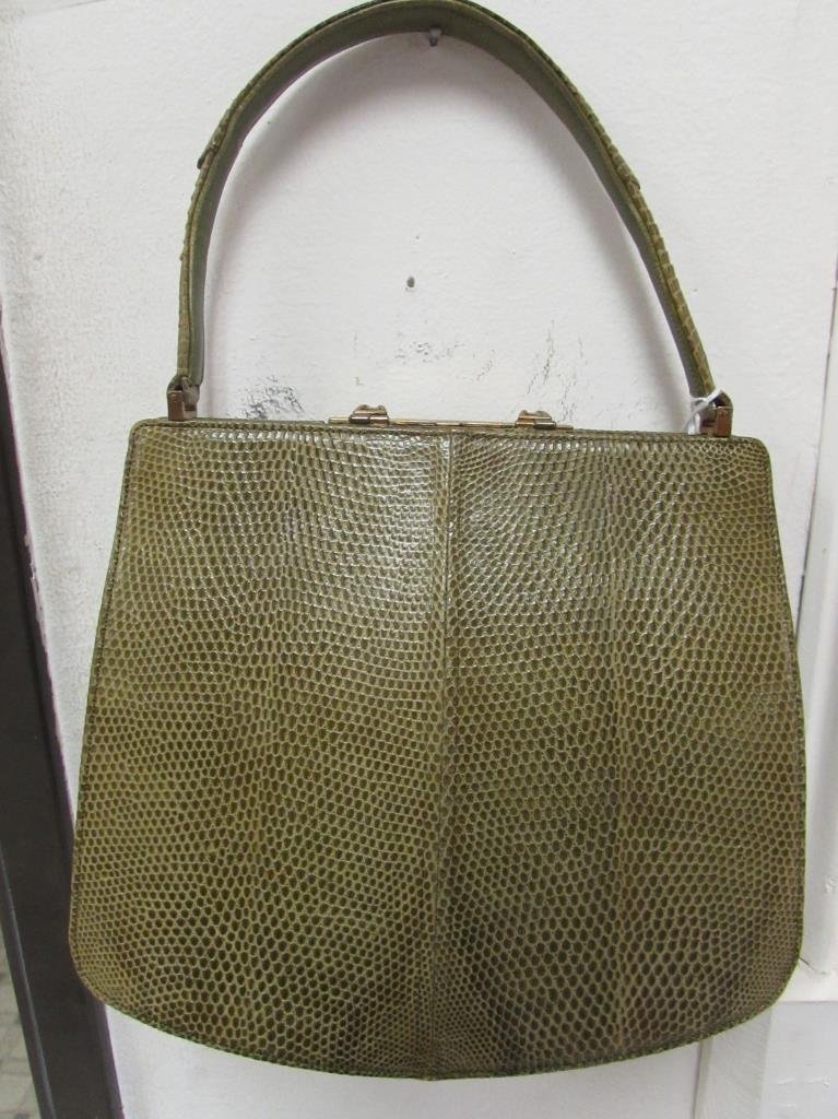I. MAENIN and COMPANY RENDL ORIGINAL HANDBAG: I. MAENIN and COMPANY RENDL ORIGINAL HANDBAG Reptile pattern, Gold hardware, One zipper pocket and two open pockets Ivory color in the inside with gold accents, Some ink markings on the inside, Little