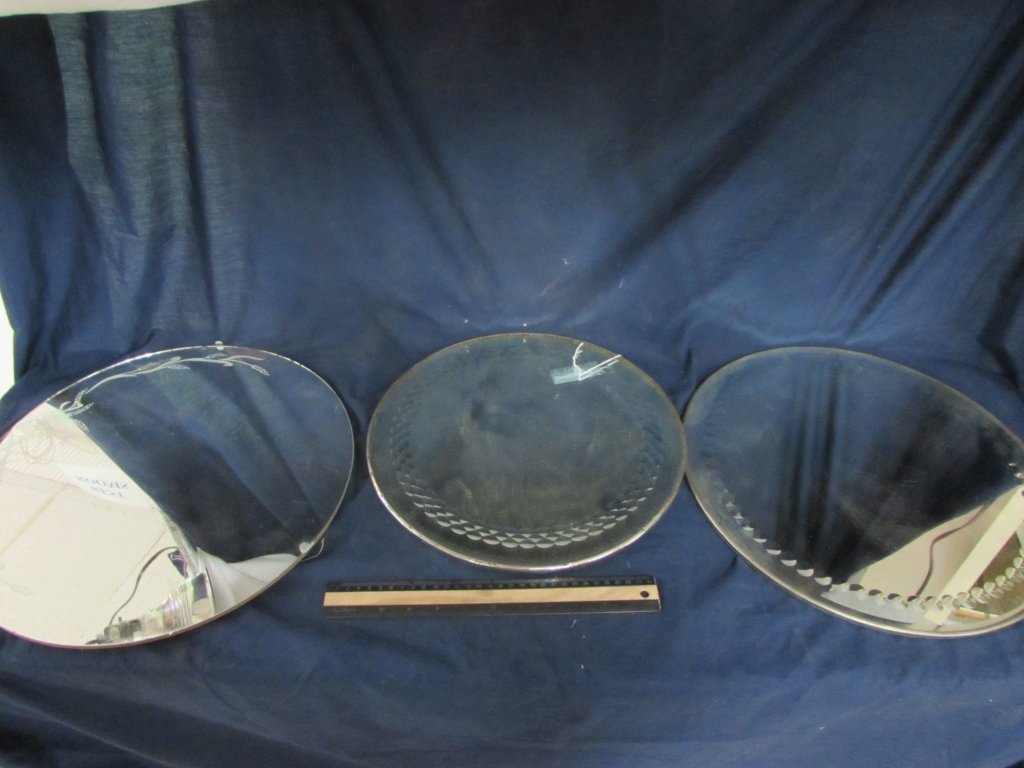 VINTAGE MIRRORS (3): VINTAGE MIRRORS (3) 1. 16" diameter, no markings, has metal around the edge 2. Vintage etched round mirror, clasps to hold mirror on backing, 15.5" diameter 3. 14" diameter,metal around edge, no marki