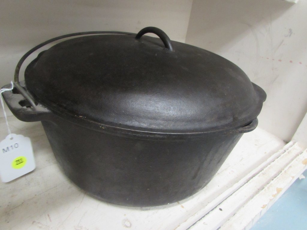 CAST IRON POT WITH LID: CAST IRON POT WITH LID MADE IN USA, 13 INCH ACROSS