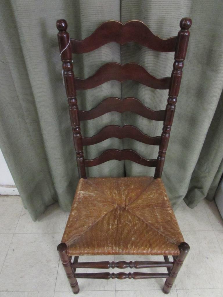 VINTAGE LADDER BACK HAIR: VINTAGE LADDER BACK HAIR RUSH WOVEN SEAT, DARK STAINED WOOD. GOOD CONDITION. 43.5" TALL
