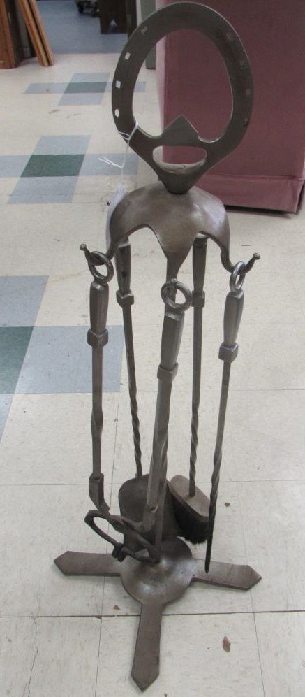 METAL FIREPLACE TOOL SET: METAL FIREPLACE TOOL SET UNIQUE AND HEAVY 4 PIECE TOOL SET. 40" TALL TO TOP OF HORSE SHOE.