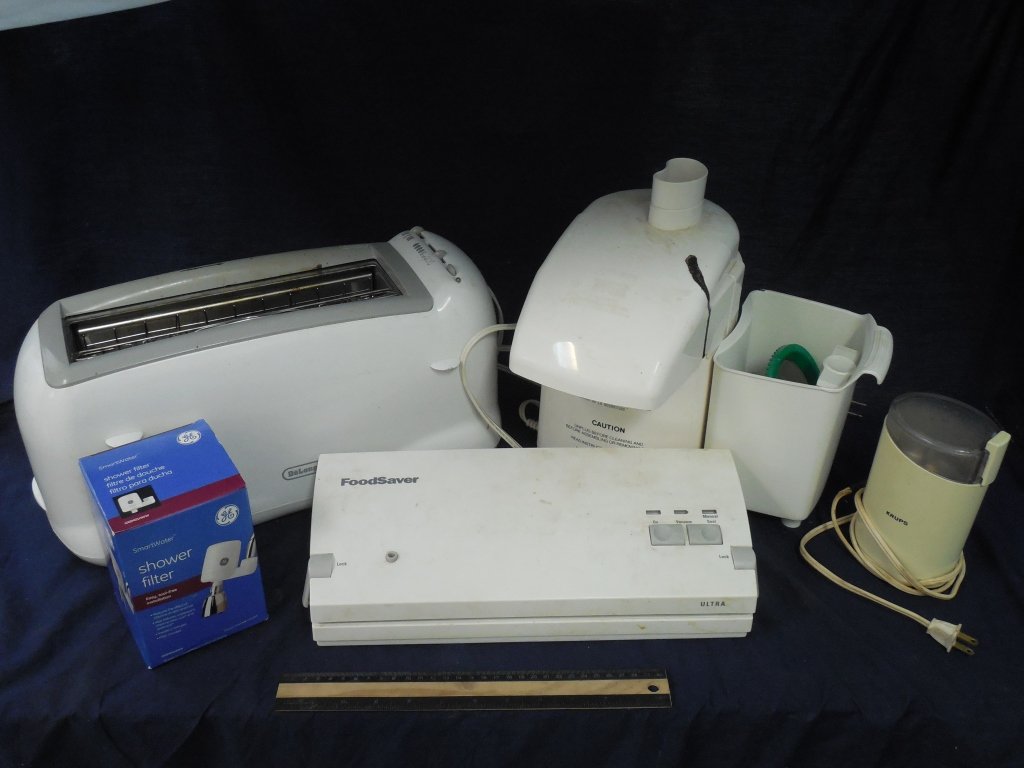 KITCHEN APPLIANCES: KITCHEN APPLIANCES KRUPS COFFEE GRINDER, FOOD SAVER ULTRA, SHOWER FILTER NEW IN BOX, VE LONGHI TOASTER, THE JUICEMAN JUICER