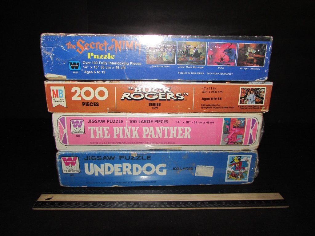 4 VINTAGE JIGSAW PUZZLES: 4 VINTAGE JIGSAW PUZZLES THE SECRET OF NIMH, BUCK ROGERS, THE PINK PANTHER, UNDERDOG