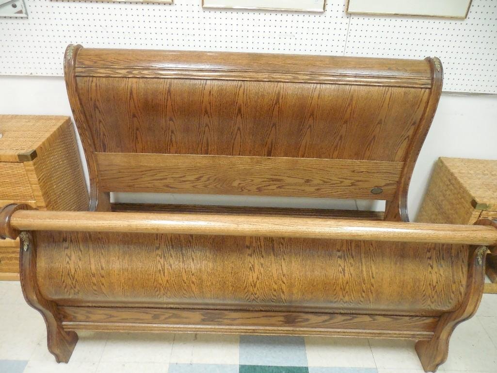 American Heirloom Oak Queen Size Sleigh Bed: Headboard is 45" tall and the footboard is 31" tall.