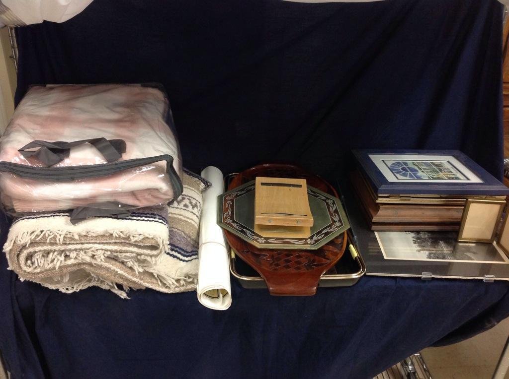 Picture Frames, Rug and Blankets: Sering Trays, picture , throw blankets, beige and tan colored woven rug
