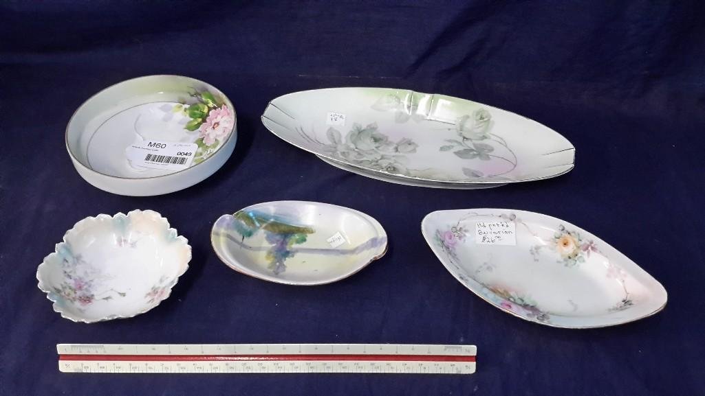 Nippon and Austria Hand Painted Serving Dishes: Nice assortment of hand painted ceramic dishes. 8.5" oval dish marked Austria, round footed bowl marked Nippon, one 6" oval bowl marked Nippon and three other unmarked bowls