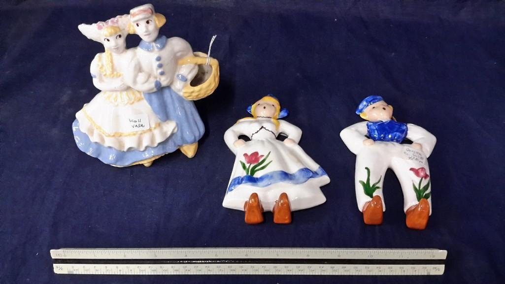 Ceramic Wall Figurines: Pair Dutch boy and girl wall plaques from Decora (Calif) and a wall pocket or table top planter, dutch boy and girl