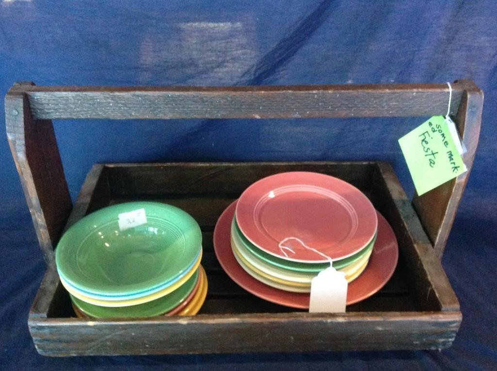 Plate and Bowl Assortment, some marked Fiestaware (12): Nice Assortment of plates and bowls in a wooden carrying box with a handle. Assortment includes 10 plates and 3 bowls in various sizes and colors. Some are marked Fiestaware. Colors vary, includi