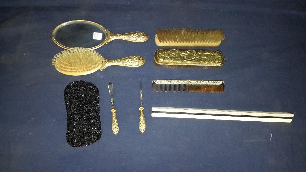 Gold Metal Vanity Set (8): Hair brush, hand mirror, 2 clothing brushes, comb, and utility items