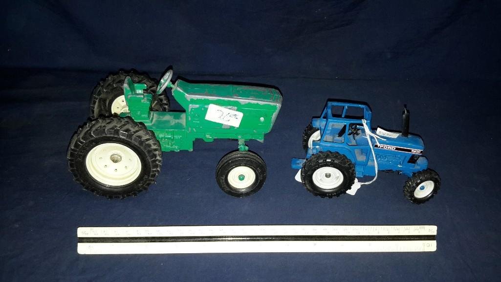 Metal Toy Tractors (2): Green tractor is marked the ERTL co. stk. #415 and is 8.5" tall, blue tractor says Ford 8630 power shift and is 5.5" long