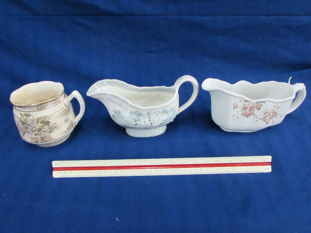 (2) Ceramic sauce boats & a ceramic cup: Ironstone sauce boat, Servern sauce boat, & a unmarked ceramic cup with a floral design and gold gilt