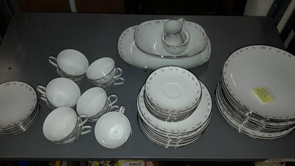 Noritake dishware (53 pcs): Cups and saucers, dinner plates, cream & sugar bowl (missing lid), salad plates, bread plates, & 2 other serving dishes