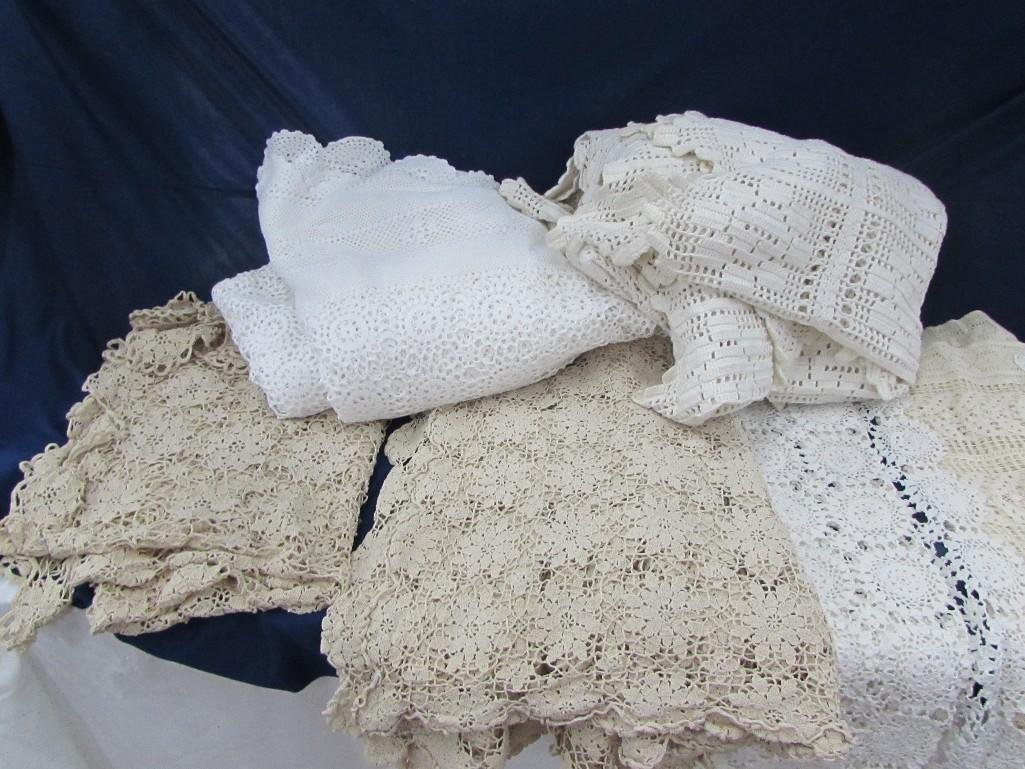 Collection of Vintage Crocheted Tablecloths and: Nice Collection of Vintage hand crocheted tablecloths and coverlets. Various colors and sizes, coverlet is marked twin. All are in fair to good condition. 
