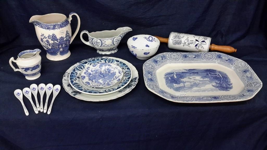 Blue and White Dishware (15): Lot includes sauce dishes, rolling pin, serving platter, pitcher and plates in various sizes, some marked Wedgewood, old Chelsea, England and others