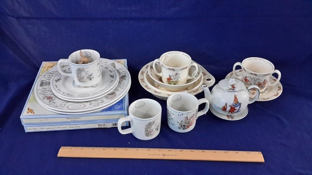 Bunnykins and Peter Rabbit Ceramic Dishes: Bunnykin Doulton, and Peter Rabbit Wedgwood baby dish sets. Total of 17 pieces.