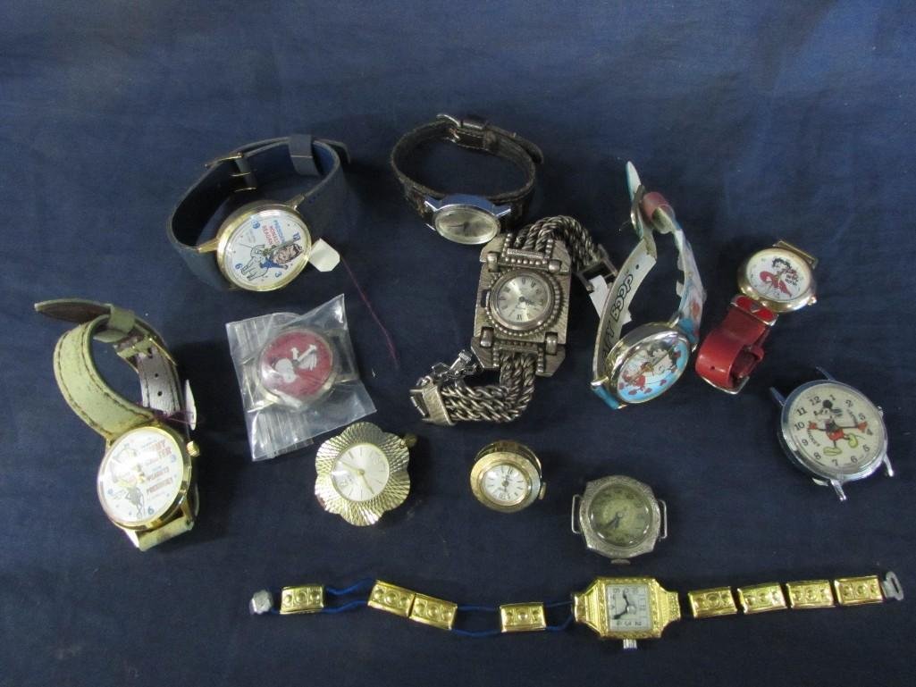 Wrist Watches and parts: Ronald Reagan and Jimmy Carter faces wrist watches, Betty Boop wrist watches (2), timex watch, vendome ladies watch, Mickey Mouse watch no band and four other watch face only, no bands