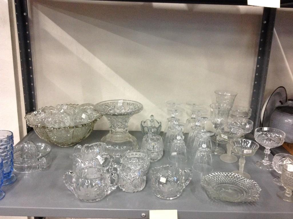 Crystal and impression glassware: Punch bowl set, clear glass juice reamer, crystal creamers, stemware and more