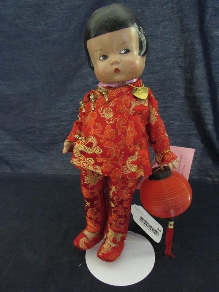Effanbee Oriental Patsy Doll: Attached paper says "Effanbee Doll Co., Doll Classics, Oriental Patsy, V542". She is 12" tall, made of plastic w/movable arms and legs. In good condition.