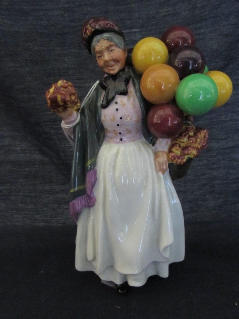 Royal Dalton Biddy Pennyfarthing Figurine (Balloon: Stamped on bottom "Made in England Royal Dalton, Biddy Pennyfarthing H.N. 1843". She is 8.5" tall in good condition. 