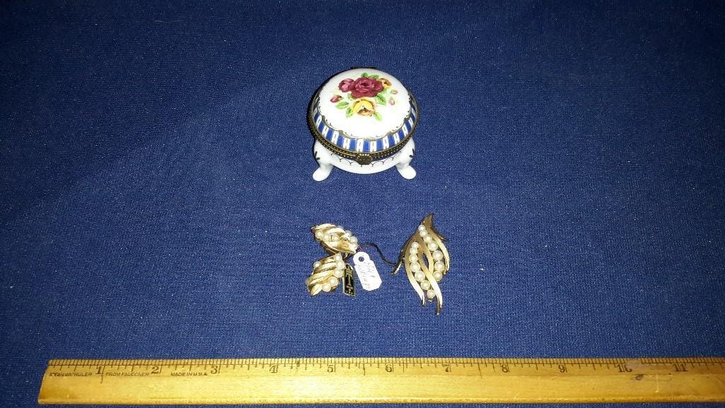 Porcelain Footed Ring Box and Vintage Jewelry: Nice Floral Design Round Porcelain Footed Ring Box, stands about 2 inches high. Trifari pearl and gold tone brooch and clip earrings. Both are in great condition.