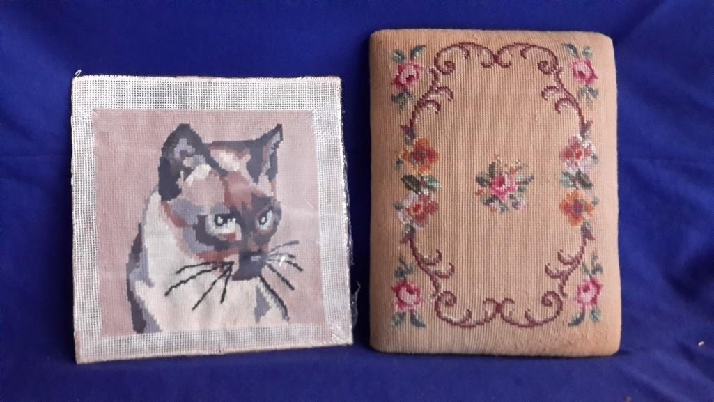 Textiles and Political Poster: quilted pieces, lace, crocheted piece, and needlepoint fabrics