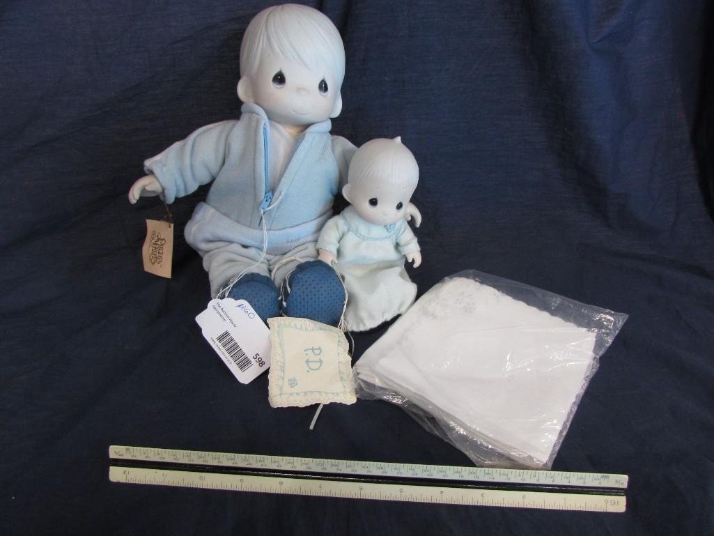Precious Moments Dolls and Handkerchiefs: Both dolls have tags , large is 13" tall- has cloth body and porcelain head and hands. Small doll is 8" tall, cloth body with porcelain head and hands. Handkerchiefs are new, delicate floral