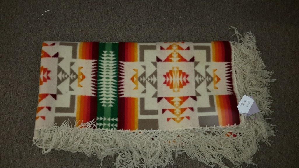 Vintage Indian Blanket: Multi colored reds, oranges, and tans. Measures 60 x 62.