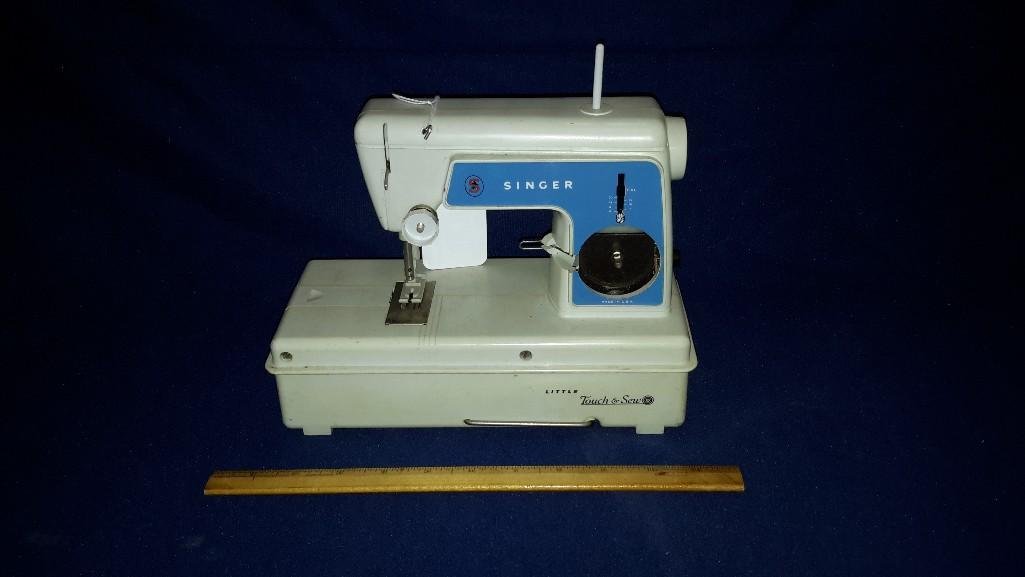 Vintaage Singer Sewing Machine: Little Touch & Sew sewing machine. 8" tall x 10" wide. Battery opreated.