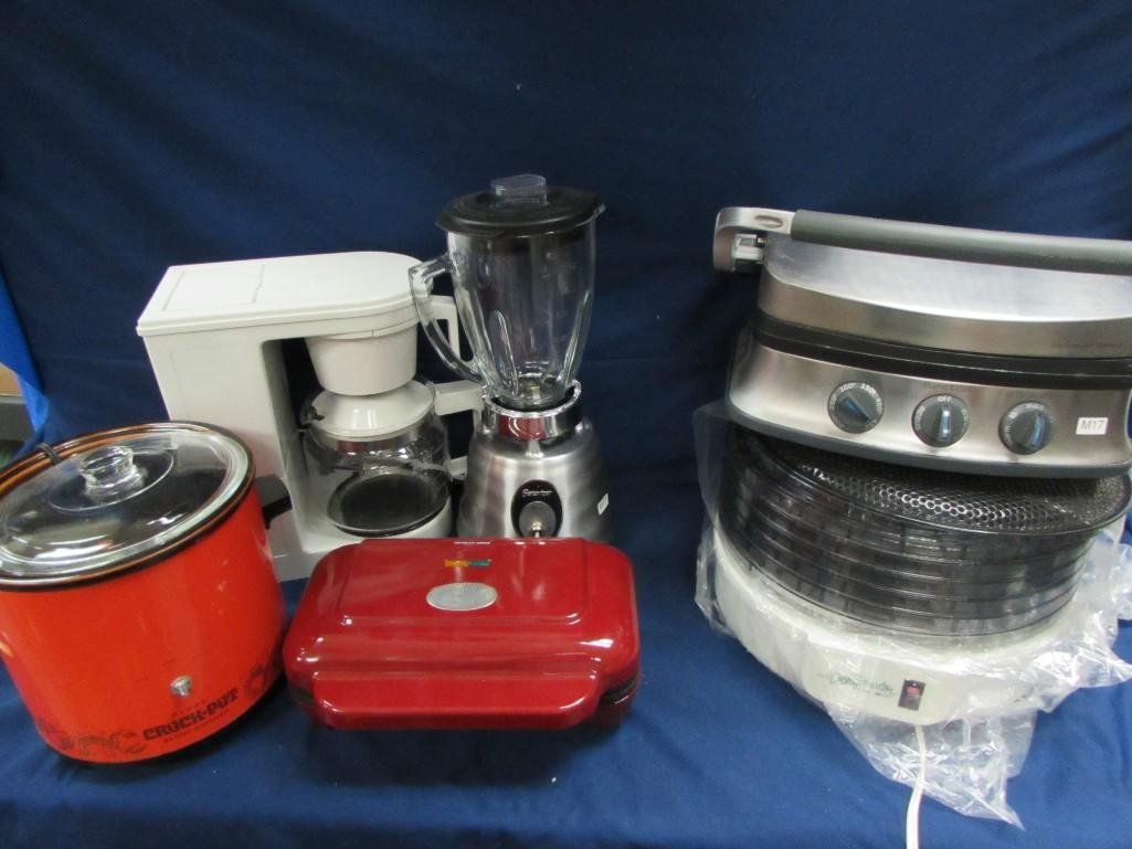 Small Electrical Kitchen Appliances (6): Food network Griddle and Grill. Meatball Maker by Bella. Mr. Coffee Food Dehydrator like new condition. Rival Crock pot. Osterizer blender. Proctor Silex 10 cup coffee maker.