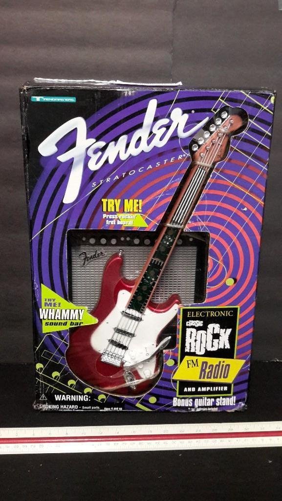 Fender Stratocaster FM Radio: In original packaging, FM radio and Amplifier 