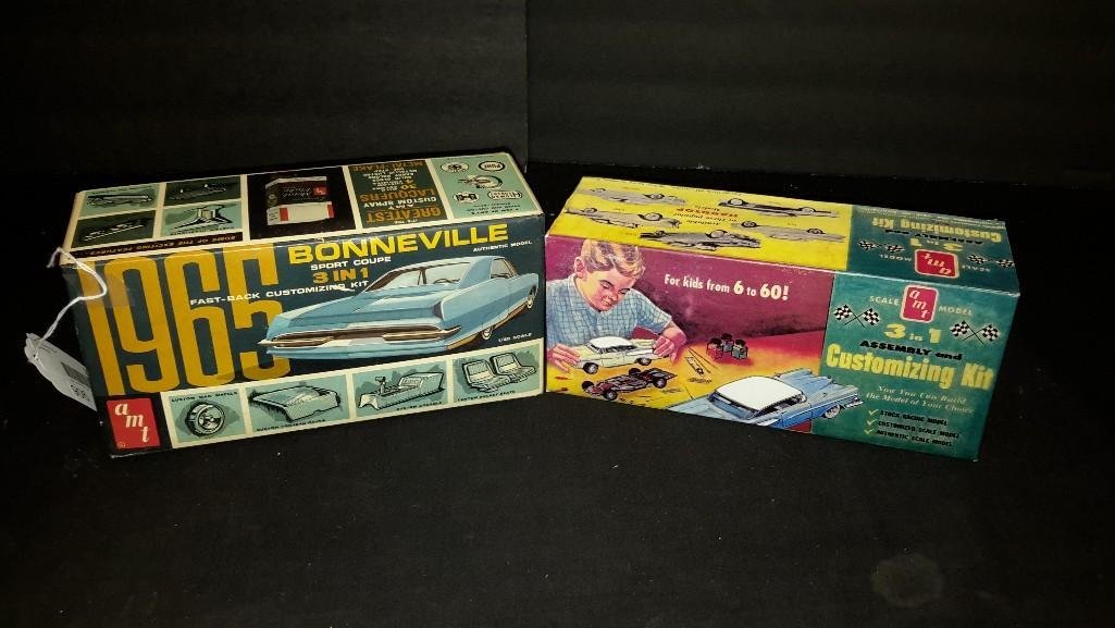 Vintage AMT Plastic Car Model Kits (2): Both are in original boxes, but have been opened and partially assembled, '65 Bonneville, & '58 Edsel Hardtop