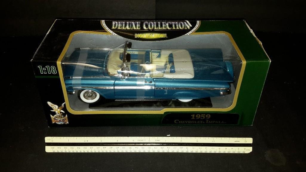 1959 Chevrolet Impala Model car: In original packaging, deluxe collection, die cast metal