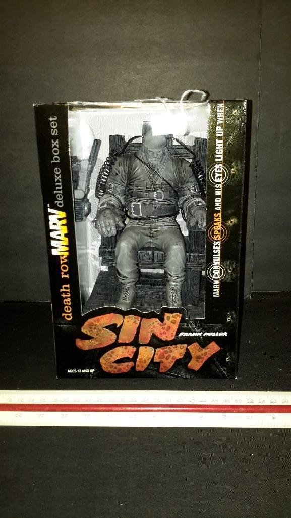 Sin City Death Row Marv Deluxe Box Set: Comes in original packaging, battery operated, lights up, speakes, & convulses