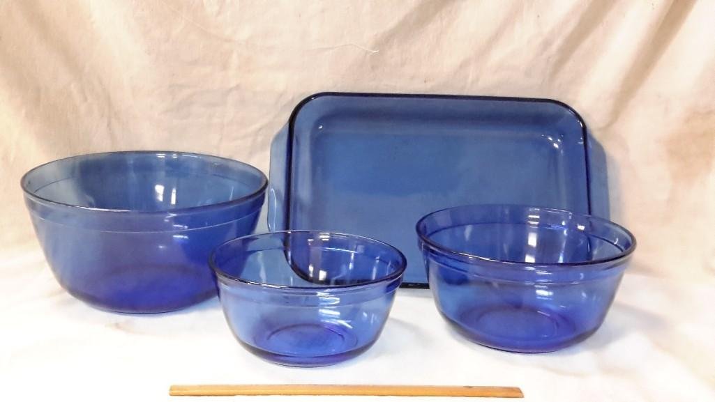 Blue Glass Mixing Bowls and Casserole dish (4): Three Anchor Ovenware Mixing bowls and one Pyrex casserole dish.
