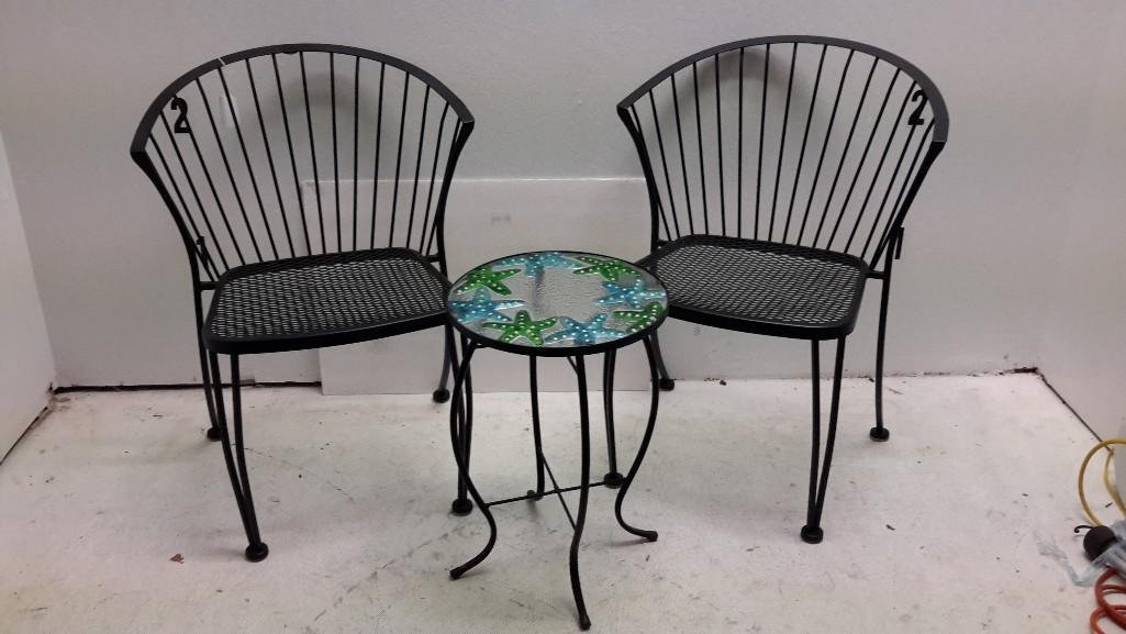 Iron Table and Chairs (3): Table has glass top with starfish design. Measures 21" tall and has 14" diameter. Chairs are 31 1/2" tall, 24" wide and 17" deep. Chairs have small plaques that says Carolina