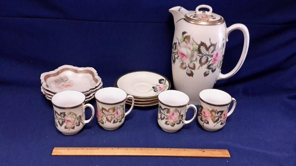 Hand Painted Prussia Tea Set (13): Tea pot is 8 1/2" tall, floral pattern with gold detail. Cups (4) measure 2.75" tall. Saucers (4) have 5" diameter. Dessert bowls (4) have a 5" diameter. Bottom stamped Prussia Han