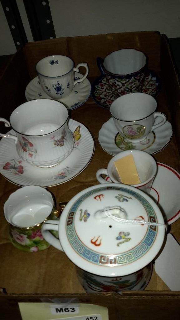 Cups and Saucers (13): One Asian themed mug with lid - Made in China; Cup and Saucer Rosina China Company with butterfly motif; Set with flamingo that says Bahamas with 24k gold detail; Lefton China Hand Painted tea cup wit