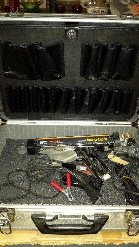 Brief Case Style Box with Tools: Foam lining, latches shut, Includes Craftsman Timing Light and more...