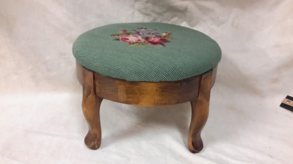 Vintage Needlepoint Footstool: 7.5 inches tall and 11.5 inches wide in good condition. Floral needlepoint design. 