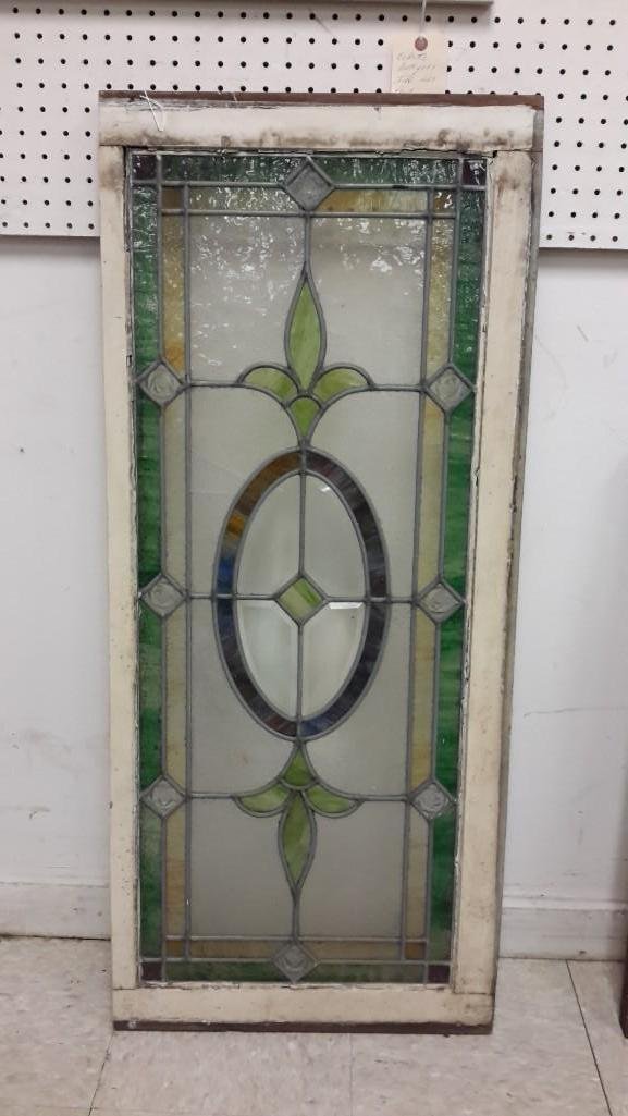Vintage Stained Glass Architectural Salvage Window: Measures 19 x 44.5 inches. green,red,clear and slag glass. Wood frame with original white chippy paint. Some cracks in glass.